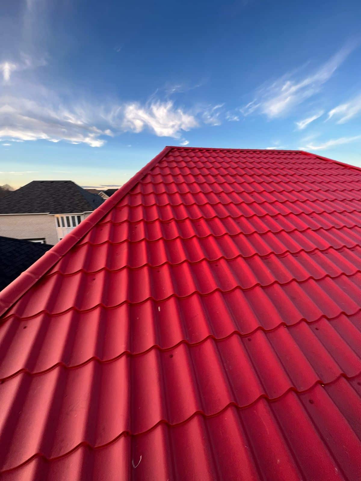 bold colours metal roofing innovations for 2024: red metal roof