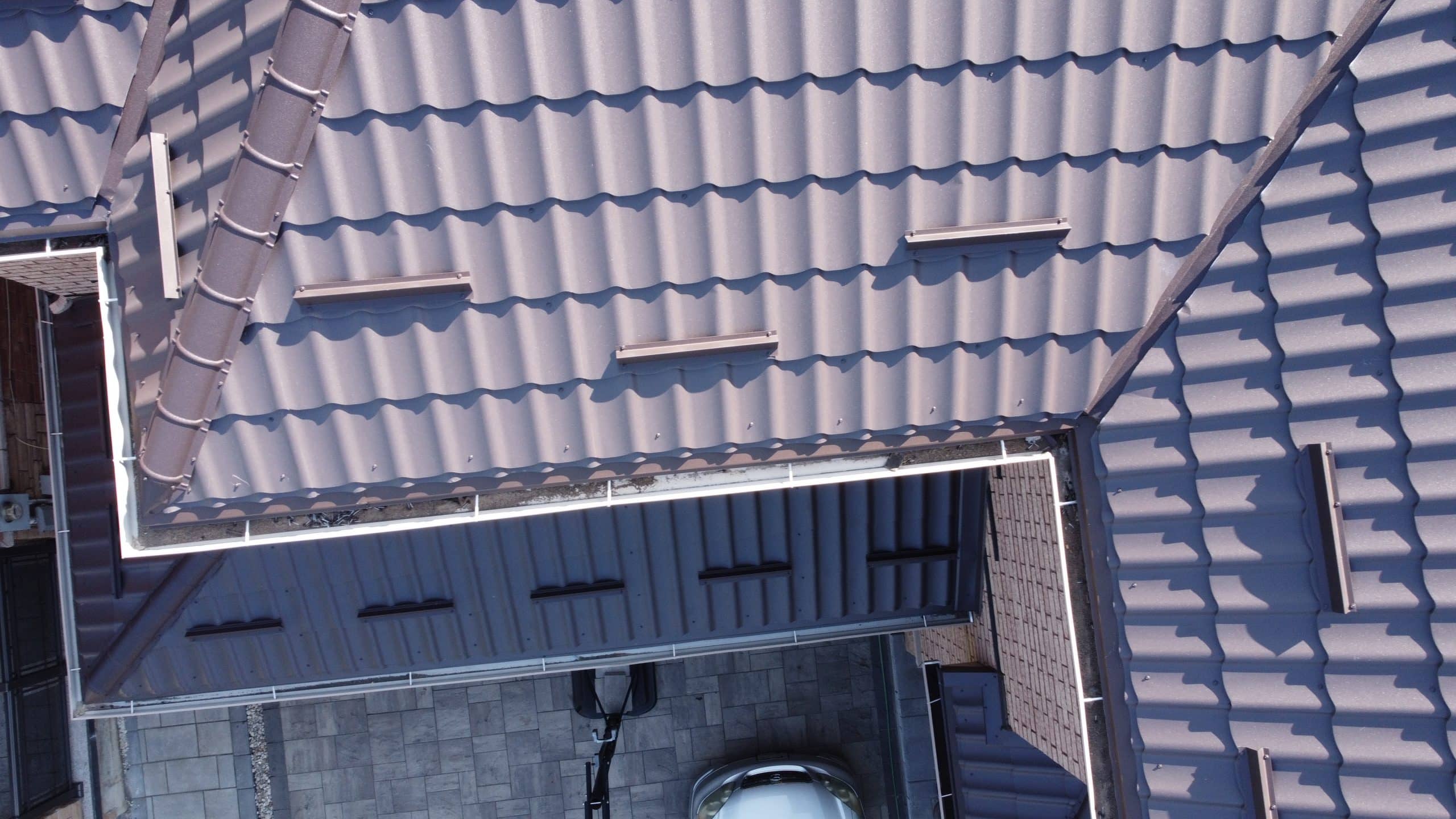 snow guards on metal roof installation