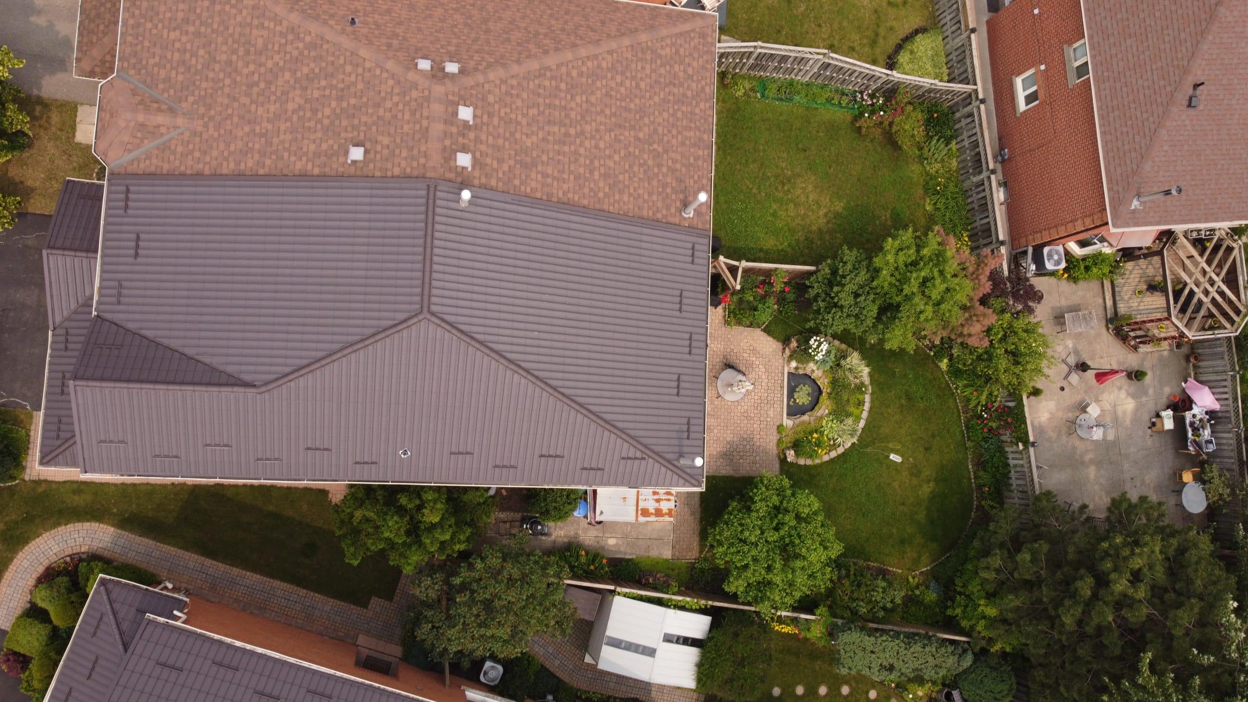 metal roof over shingles problems